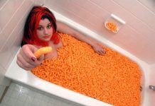 Naked Burglar Found In Tub Eating Cheetos